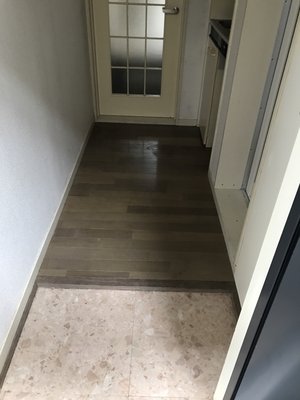 玄関まで散らかった紙類・日用品ゴミのお片付けの施工後